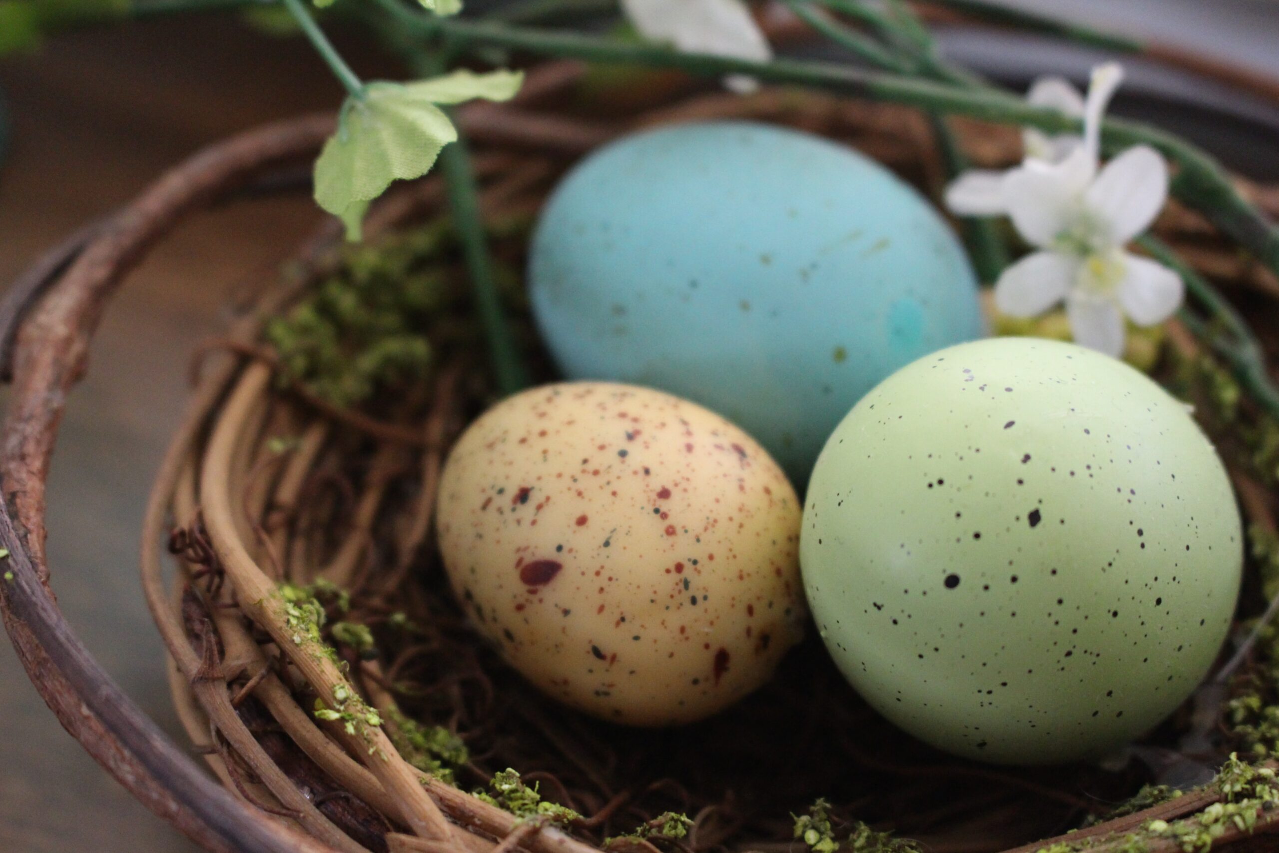 speckled eggs in a basket