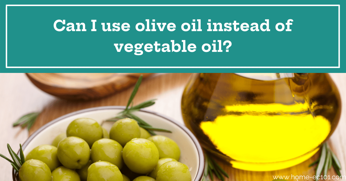 olives and oil on a wood background with a text overlay that says Can I use olive oil instead of vegetable oil?